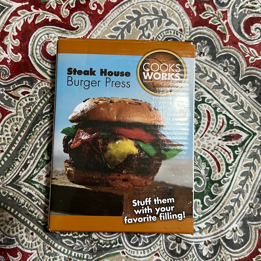 New in box Burger press